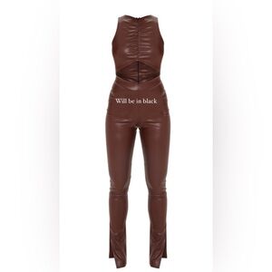 This BLACK faux leather jumpsuit has great stretch. -Wrap around legs